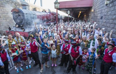 Cheers from guests filled the air at Hogsmeade Station today as Universal Orlando Resort celebrated its one millionth rider on the Hogwarts Express – the iconic train that transported Harry Potter and his friends between Hogsmeade Station and King’s Cross Station in J.K. Rowling’s beloved series. To celebrate this magical milestone, nearly two hundred guests were given complimentary Butterbeer ice-cream.
 
© 2014 Universal Orlando Resort. All rights reserved.
